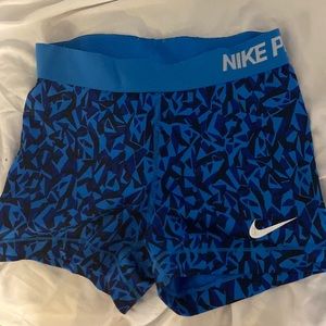 Blue Nike pro shorts